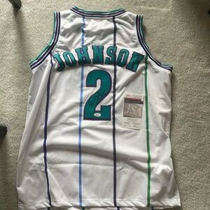 Larry Johnson signed autograph jersey. Authentic JSA. Galaxy RIP box.